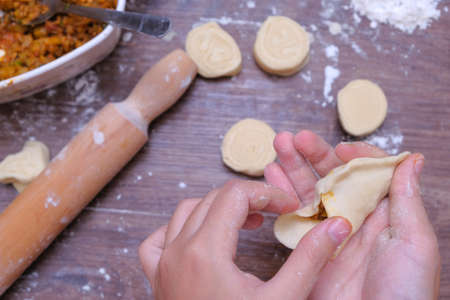 Woman making curry puff.の写真素材