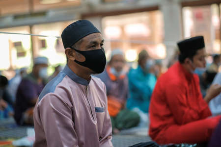 Muadzam Shah, Malaysia - July 3rd, 2020 : Muslims performed the Friday Prayer at Muadzam Shah Mosque during Covid-19 pandemic. Maintaining Social distancing guidelines.のeditorial素材