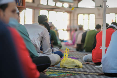 Muadzam Shah, Malaysia - July 3rd, 2020 : Muslims performed the Friday Prayer at Muadzam Shah Mosque during Covid-19 pandemic. Maintaining Social distancing guidelines.のeditorial素材