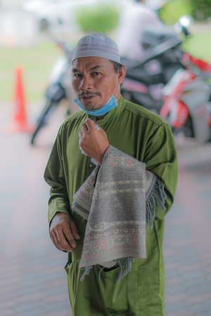 Muadzam Shah, Malaysia - July 3rd, 2020 : Muslims performed the Friday Prayer at Muadzam Shah Mosque during Covid-19 pandemic. Maintaining Social distancing guidelines.のeditorial素材