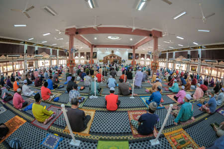 Muadzam Shah, Malaysia - July 3rd, 2020 : Muslims performed the Friday Prayer at Muadzam Shah Mosque during Covid-19 pandemic. Maintaining Social distancing guidelines.のeditorial素材