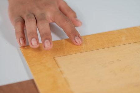 Process of gluing plank of plywood. Furniture making