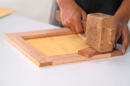 Process of gluing plank of plywood. Furniture makingの写真素材