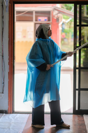 Muadzam Shah, Malaysia - July 22th , 2020 : Painter with disposable overalls coveralls hood painters...