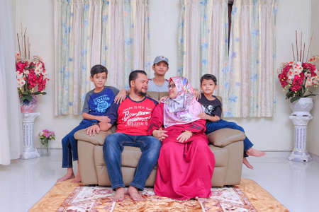 Muadzam Shah, Malaysia - June 21st, 2020 :  Happy Malay family during Hari Raya. Malaysian family lifestyle at home. Happiness concept.のeditorial素材