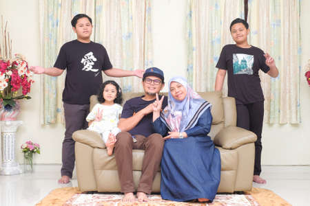 Muadzam Shah, Malaysia - June 21st, 2020 :  Happy Malay family during Hari Raya. Malaysian family lifestyle at home. Happiness concept.のeditorial素材