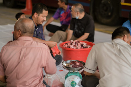 Muadzam Shah, Malaysia- August 10th,2020 : Unidentified man   weighing meat in Kolej Vokasional...