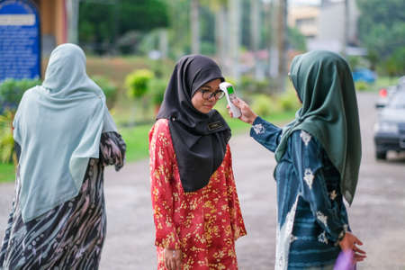 Muadzam Shah, Malaysia- August 4th, 2020 : Coronavirus check post on street car  doctors checking body temperature corona virus covid-19 epidemic.
Keywordsのeditorial素材