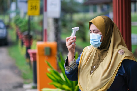 Muadzam Shah, Malaysia- August 4th, 2020 : Coronavirus check post on street car  doctors checking...