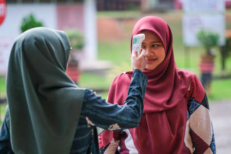 Muadzam Shah, Malaysia- August 4th, 2020 : Coronavirus check post on street car  doctors checking body temperature corona virus covid-19 epidemic.
Keywordsのeditorial素材