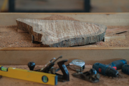 Hand tools and power tool with  slab coffee table. Woodworking and carpentry production .Furniture manufacture.の写真素材