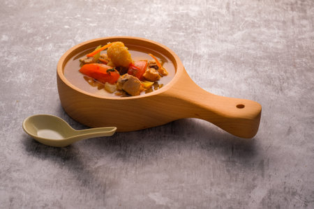 Tom Yam Kung ,Prawn and lemon soup with mushrooms, thai food in wooden bowl top viewの写真素材