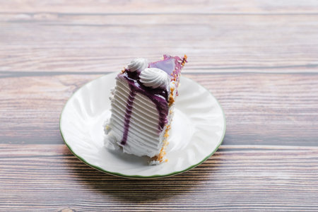 Blueberry cake on white plate