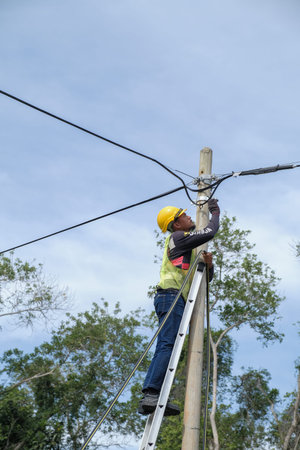 Muadzam Shah, Malaysia- September 1st, 2021 : Worker from telecomunication internet provider company...