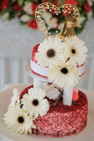 Wedding cake iced and decorated.