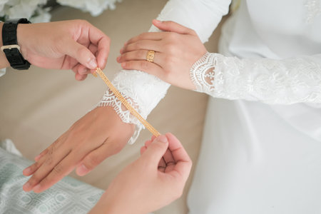 Close up of bride and groom hands with wedding rings. Wedding concept.の写真素材