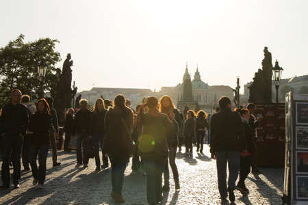 Tourists walking along Charles Bridge at sunset. Horizontal imageのeditorial素材