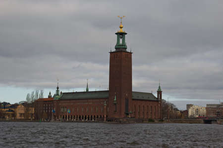 Stockholm Town Hall with cloudy skyのeditorial素材