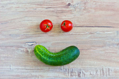 Funny smiling face. Conceptual image with vegetables. Face at the central part of imageの写真素材