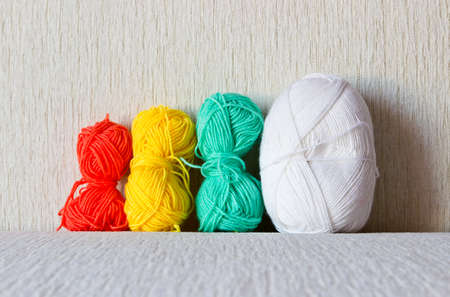 Multicolored wool yarn ballsの写真素材