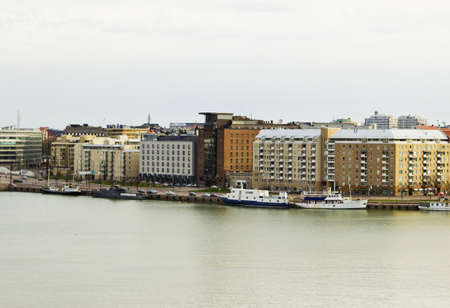 View of Helsinki embankment at cloudy sunrise, Finlandの写真素材