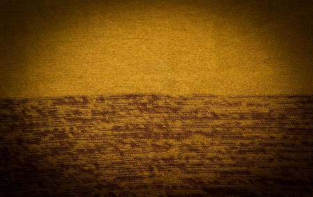 Abstract textile green background. Horizontal image with dark vignette effectの写真素材