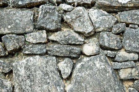 Old stone wall backgroundの写真素材