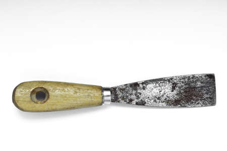 Old scraper isolated on white backgroundの写真素材