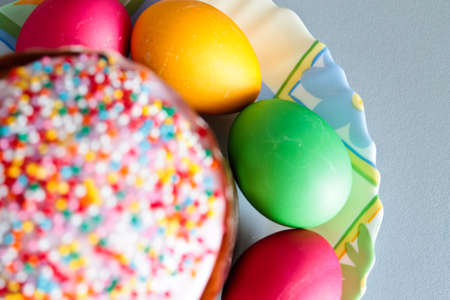 Easter cake and painted eggs closeup. Focus on eggsの写真素材