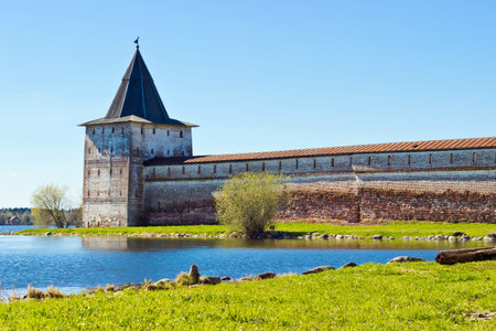 Russian orthodox monastery castle on the lake shore in Kirillov, Russia