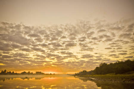 Beautiful summer landscape with tranquility sunriseの写真素材