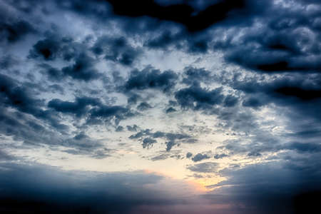 Beautiful cloudy sunrise seascape. HDR image from three photosの写真素材
