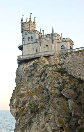 Famous Crimean landmark - castle Swallow nest or Lastochkino Gnezdo, beautiful sunset timeのeditorial素材