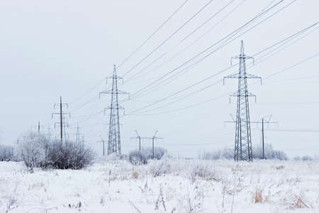 Electricity towers in winterの写真素材