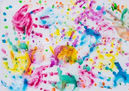 Colorful image with multicolored prints of baby hands on white backgroundの写真素材