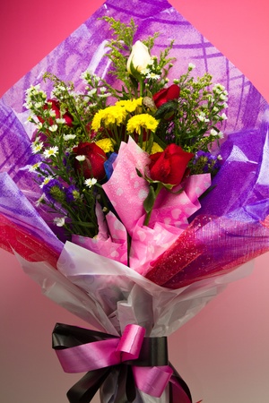 a graduation bouquet of various flowers for herの写真素材
