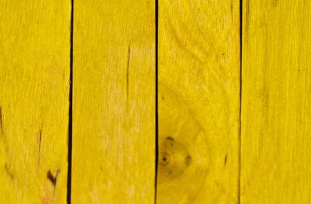vertical arrangement of yellow wood in landscape orientationの写真素材