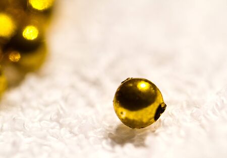 separated golden beadの写真素材