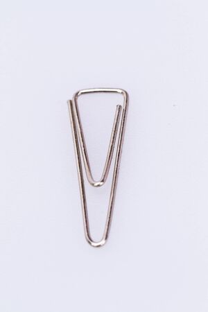 metal paperclip on white backgroundの写真素材