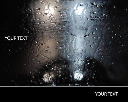 Rain drops on car glassの写真素材