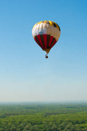 Bright balloon against the background of blue sky.の写真素材