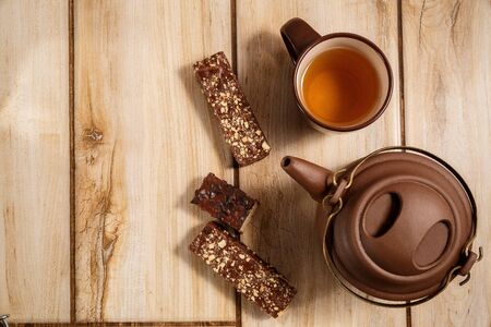 chocolate waffles and tea on wooden background . the view from the topの写真素材