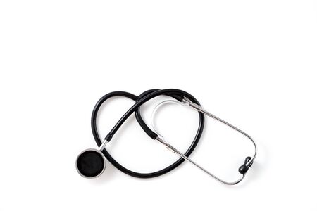 vintage stethoscope on white isolated backgroundの写真素材