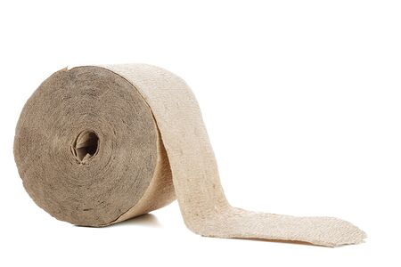 not clarified toilet paper made of untreated coarse paper or cardboard . cheap environmentally friendly option for poor countries. on a white isolated backgroundの写真素材