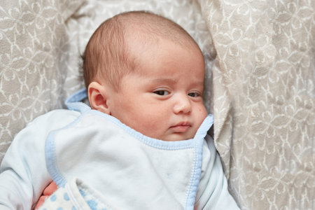 portrait of a one-month-old baby. close up. low depth of focus, selective focus.