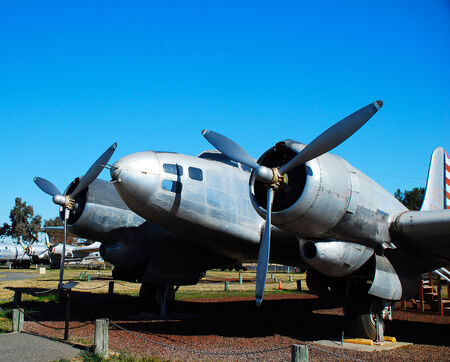 Old military aircraft on the airfield against the sky のeditorial素材