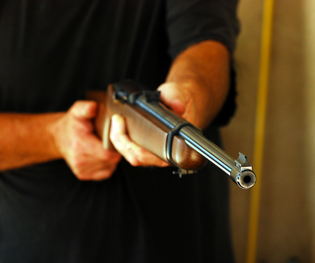 Real hunting weapon with a metal gate and trigger.の写真素材