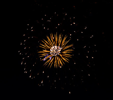 Salute colorful fireworks in the night sky for a holiday.