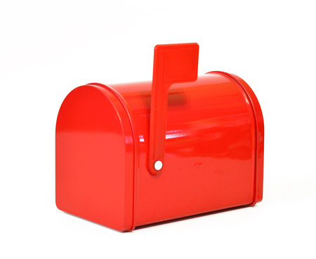 Red metal mailbox on a white background.