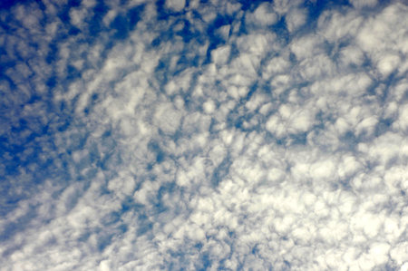 Beautiful deep blue sky with white clouds.
